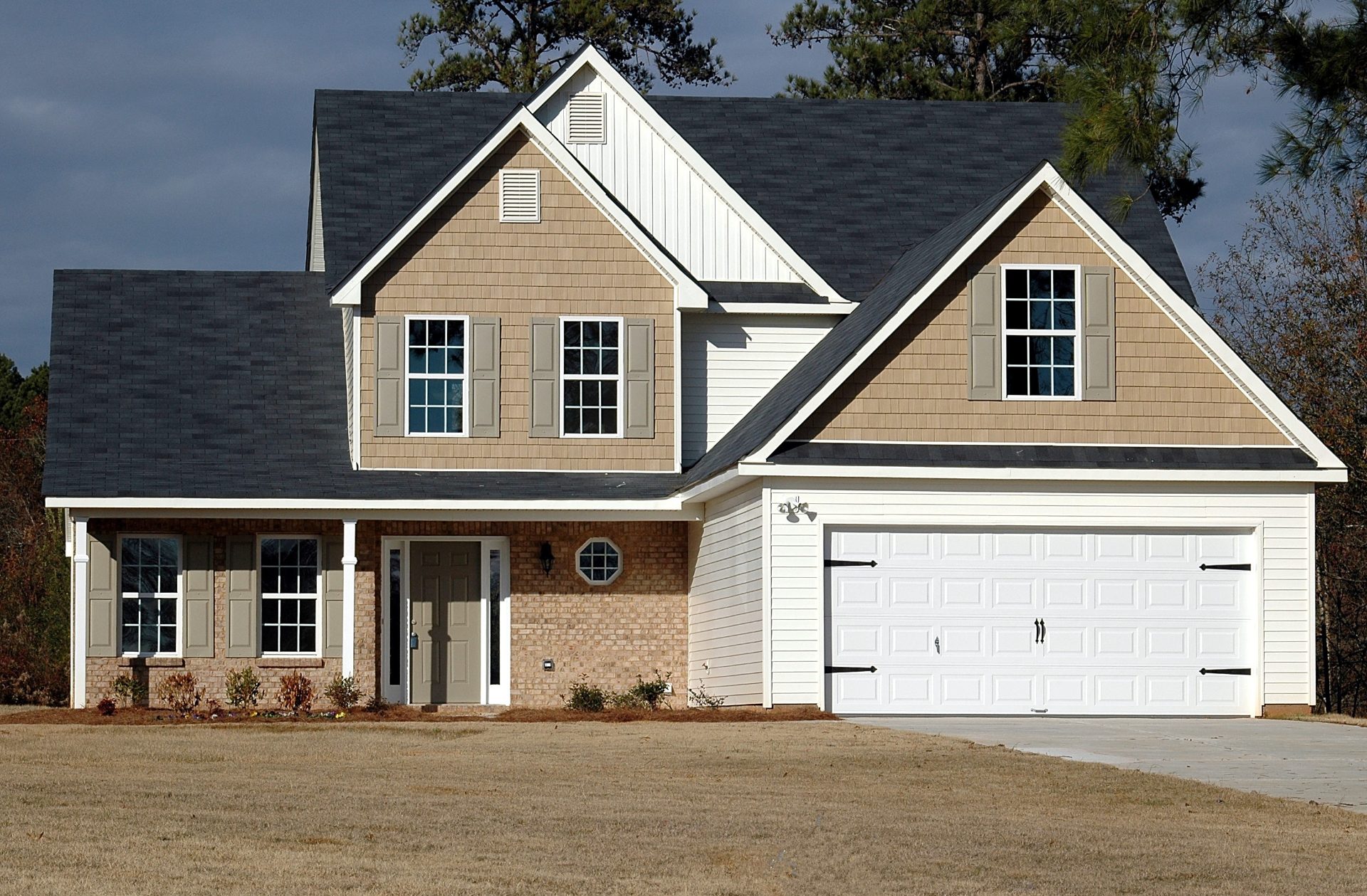 New two-story home with a two-car garage and front porch